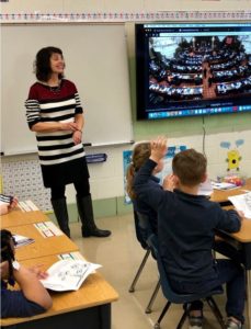 State Rep. Sue Scherer takes questions from students about her job as state representative from students at Our Lady of Lourdes School in Decatur.