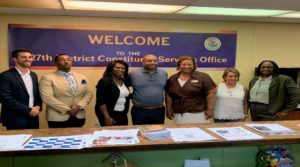 Rep. Slaughter (center) poses with the experts from the panel on accessing capital.