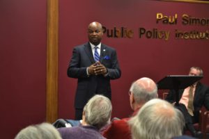 Pictures: State Rep. Emanuel “Chris” Welch, D-Hillside, gives remarks and answers questions from students and community members during the Paul Simon Institute’s “Pizza and Politics” event on Mon. Jan. 28.