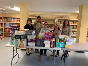 State Rep. Karina Villa, second from left, collected diapers for families in need.