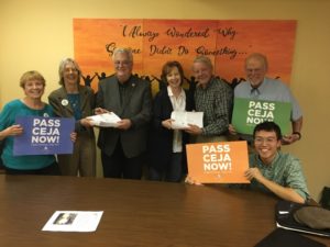 Pictured: Walker (center-left) and Gillespie (center-right) accept petitions on the Clean Energy Jobs Act from the Northwest Cook County Sierra Club.