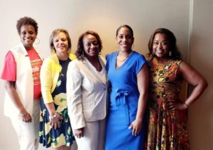 State Rep. Sonya Harper (right) with state Rep. Camille Lilly, U.S. Rep. Robin Kelly, state Sen. Mattie Hunter, and Lt. Gov. Juliana Stratton (left to right).