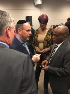 State Rep. Yehiel “Mark” Kalish, D-Chicago, discusses local projects included in the Infrastructure Investment plan with stakeholders that attended Gov. Pritzker’s press conference.