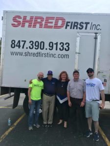 State Rep. Moylan and state Senator Laura Murphy (D-Des Plaines), with Shred First Owner Terry Casey and staff volunteers.
