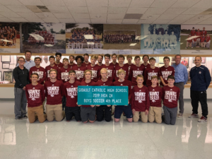 State Rep. Nathan Reitz, D-Steeleville (second from right), presented congratulatory signs to the boys’ soccer team from Gibault Catholic High School.
